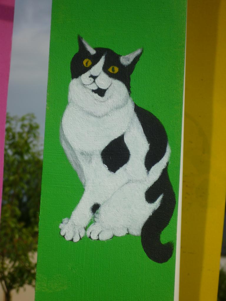 Petit chat sur fond vert ( tissu pour store )